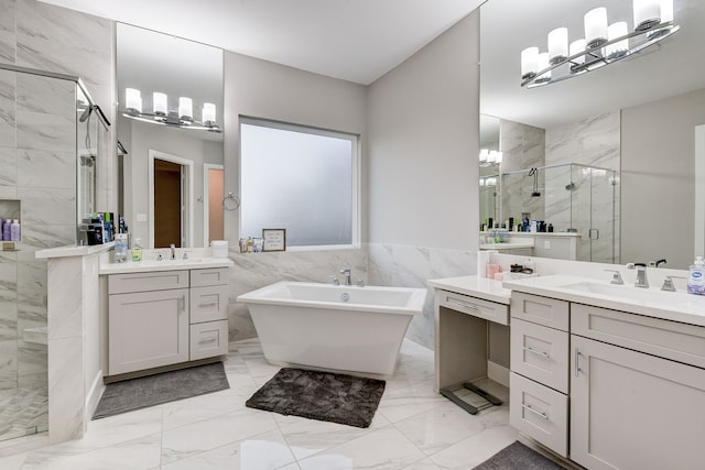 bathroom featuring vanity, tile walls, and independent shower and bath