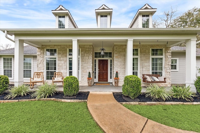 entrance to property with covered porch