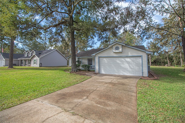 single story home with a garage, driveway, and a front lawn