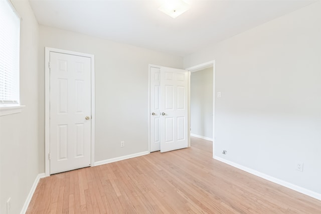 unfurnished bedroom featuring light hardwood / wood-style floors