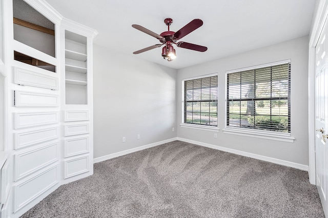 unfurnished bedroom with ceiling fan and carpet floors