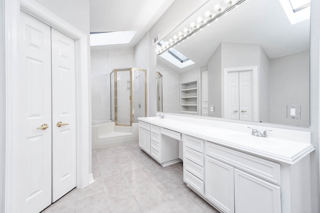 bathroom featuring vanity, tile patterned floors, lofted ceiling, and enclosed tub / shower combo