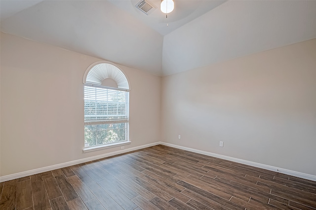 unfurnished room featuring dark hardwood / wood-style floors, ceiling fan, and lofted ceiling