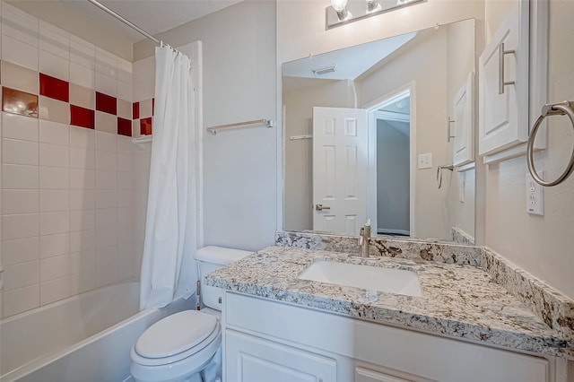 full bathroom featuring shower / tub combo, vanity, and toilet