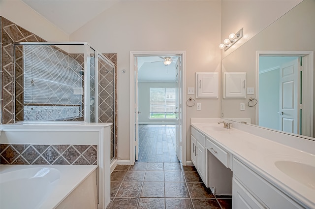 bathroom with ceiling fan, plus walk in shower, lofted ceiling, and vanity