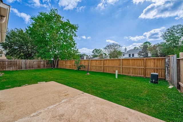 view of yard with a patio area