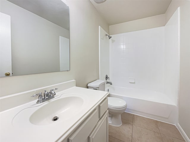 full bathroom with toilet, tile patterned flooring, vanity, and tiled shower / bath