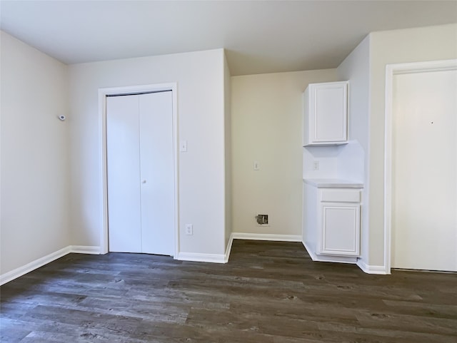 unfurnished bedroom featuring dark hardwood / wood-style floors