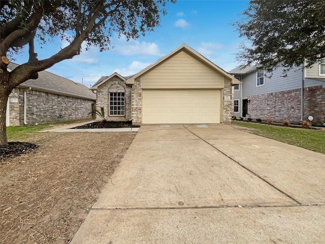 ranch-style house featuring a garage