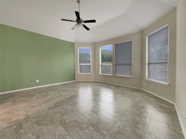 unfurnished room featuring ceiling fan and lofted ceiling