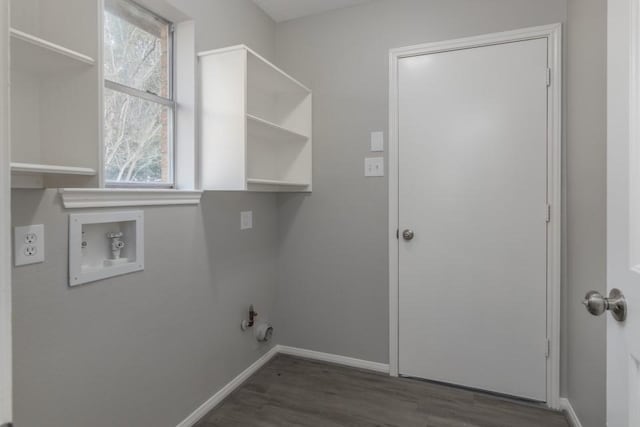 washroom featuring a healthy amount of sunlight, gas dryer hookup, dark wood-type flooring, and hookup for a washing machine