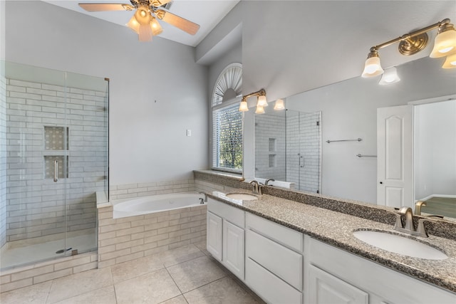 bathroom with tile patterned flooring, vanity, ceiling fan, and plus walk in shower