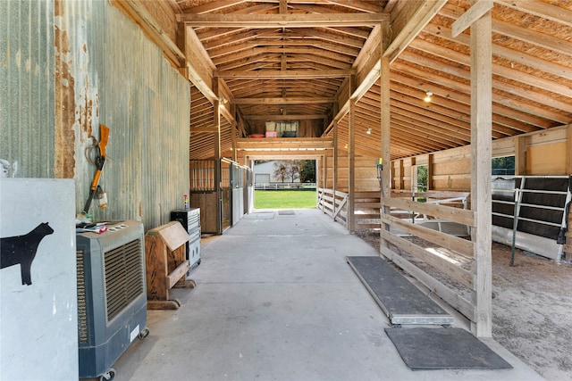 view of horse barn featuring heating unit