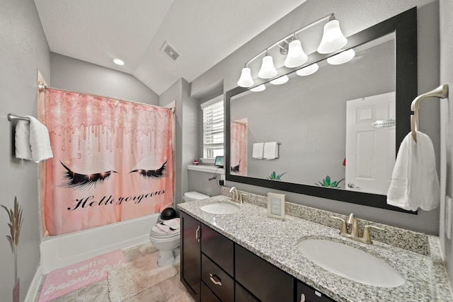 full bathroom featuring tile patterned floors, shower / bath combination with curtain, vaulted ceiling, toilet, and vanity