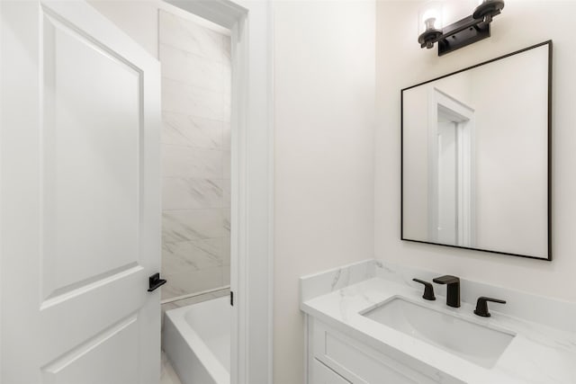 bathroom featuring a bathtub and vanity