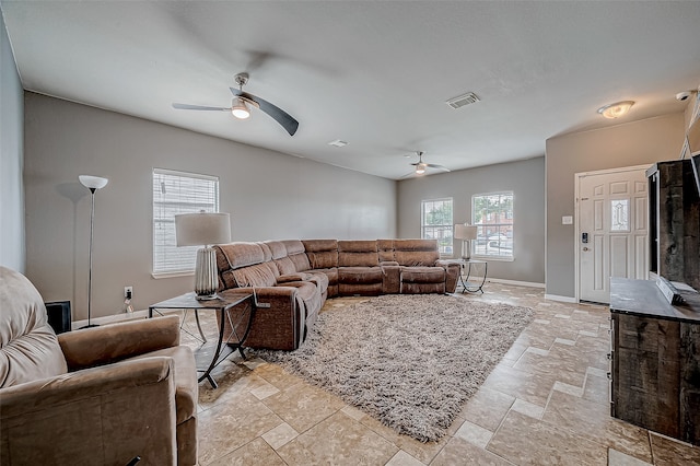 living room featuring ceiling fan