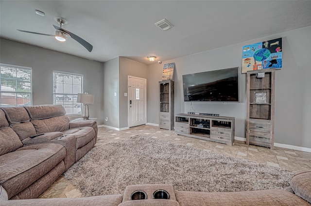 living room with ceiling fan