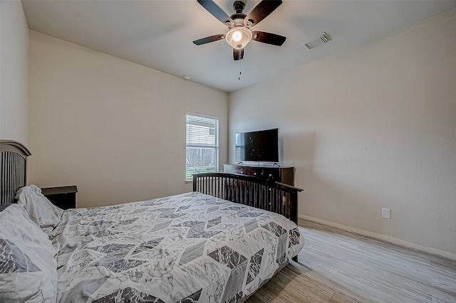 bedroom featuring ceiling fan and light wood-type flooring