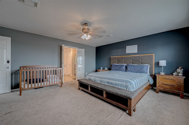 carpeted bedroom featuring ceiling fan