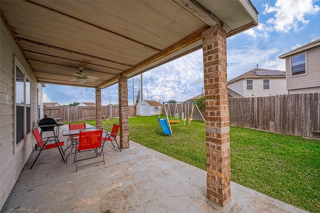 view of patio / terrace featuring a storage unit