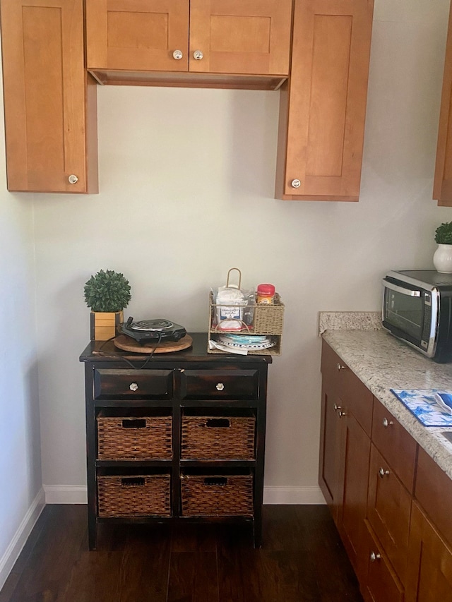 kitchen featuring dark wood-type flooring