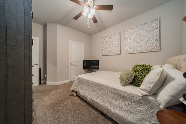 bedroom featuring carpet floors, ceiling fan, and lofted ceiling