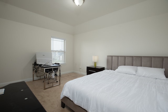 bedroom with light carpet