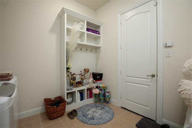 mudroom featuring light tile patterned flooring