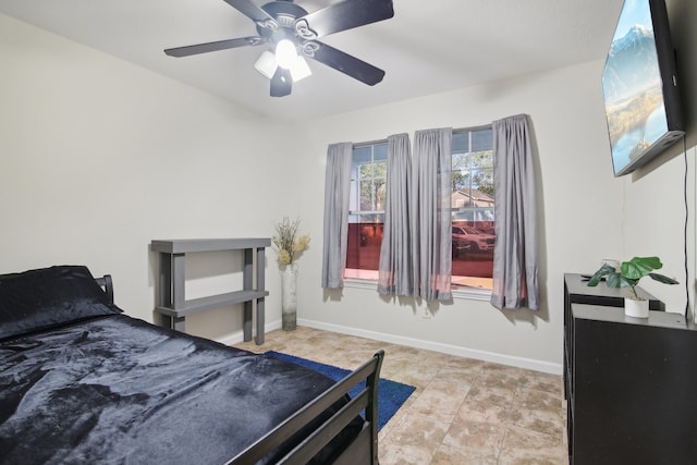 bedroom featuring ceiling fan