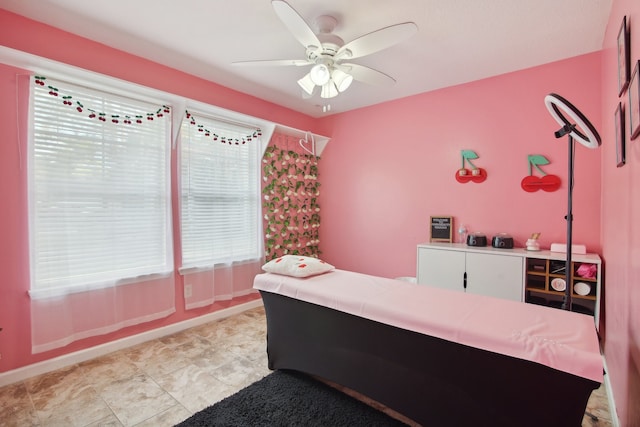 bedroom featuring ceiling fan