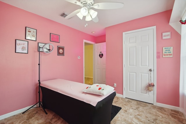 bedroom featuring ceiling fan