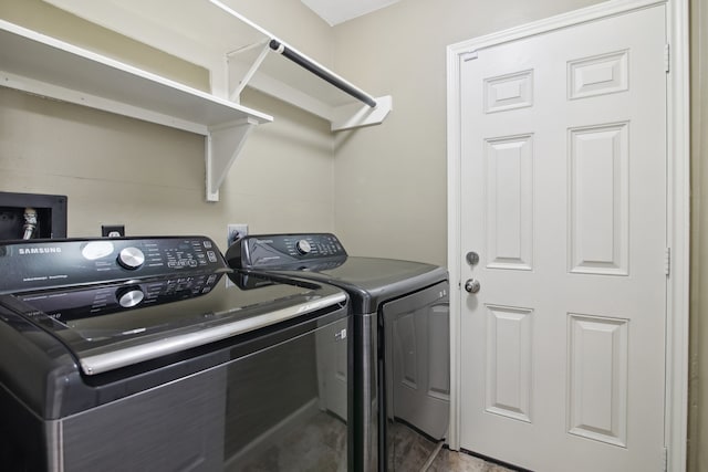 laundry room with washer and dryer