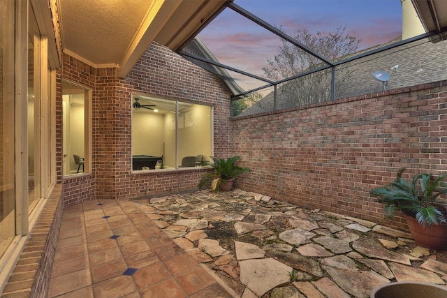 patio terrace at dusk with a lanai