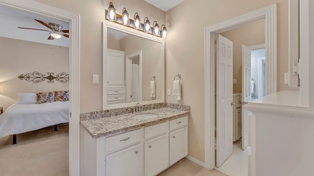 bathroom with vanity and ceiling fan