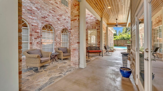 view of patio / terrace featuring ceiling fan