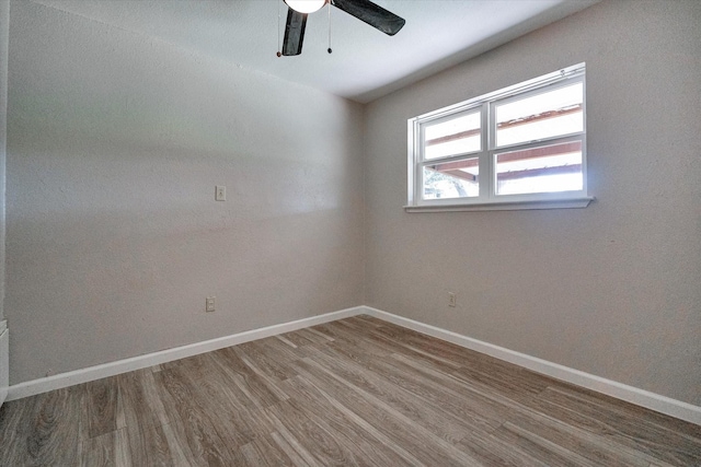 unfurnished room featuring wood-type flooring and ceiling fan