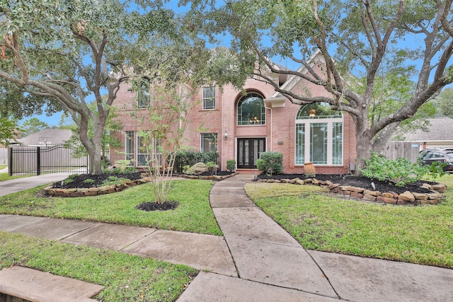 view of front of home featuring a front yard