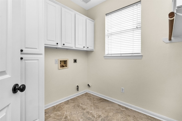 clothes washing area featuring washer hookup, hookup for an electric dryer, and cabinets