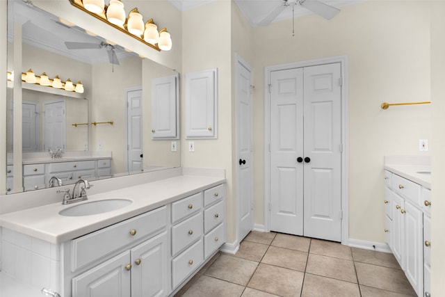 bathroom featuring tile patterned floors, vanity, ceiling fan, and crown molding