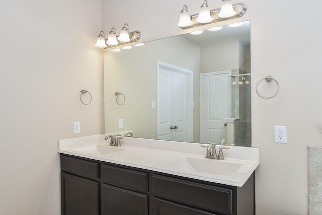 bathroom featuring vanity and a shower with door