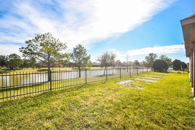 view of yard with a water view