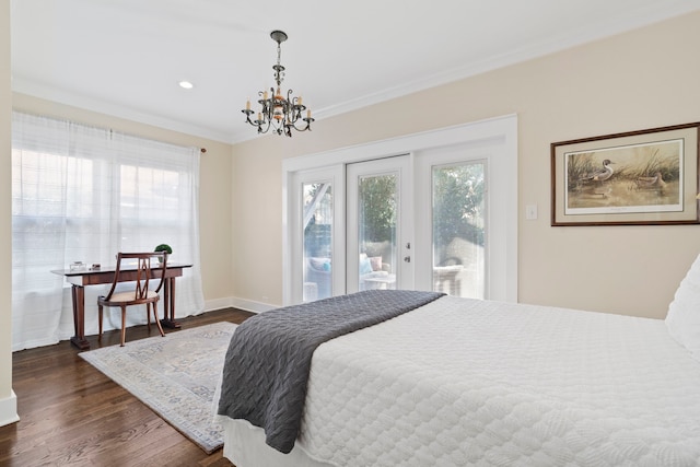 bedroom with access to exterior, a chandelier, dark hardwood / wood-style floors, and ornamental molding