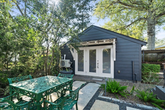 view of outdoor structure with french doors