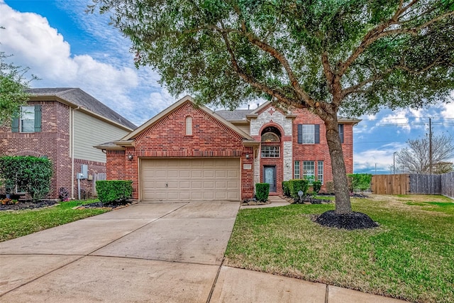 front of property featuring a front yard and a garage