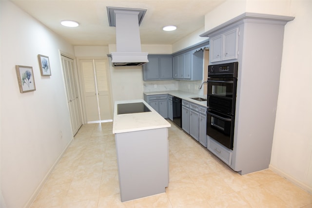 kitchen featuring black appliances, sink, gray cabinets, tasteful backsplash, and custom range hood