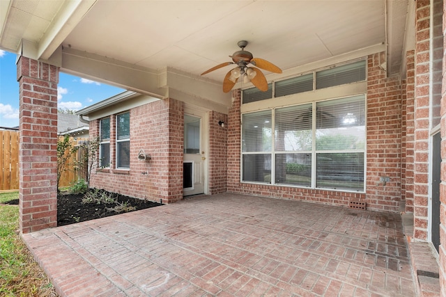 view of patio / terrace featuring ceiling fan