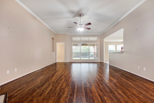 unfurnished living room featuring crown molding, ceiling fan, and dark hardwood / wood-style floors