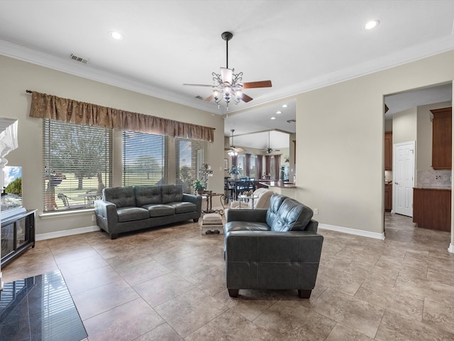 living room featuring ceiling fan and crown molding