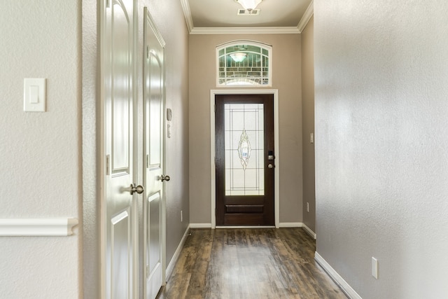 doorway to outside with crown molding and dark hardwood / wood-style flooring