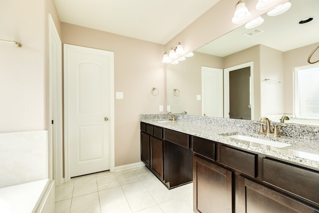 bathroom featuring vanity and tile patterned floors